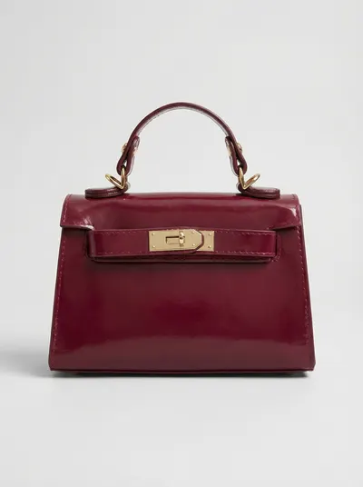 شنطة لون برغندي