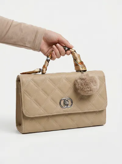 شنطة لون بيج