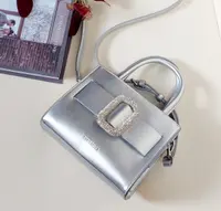 شنطة ماركة لون فضي 2