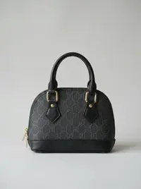 شنطة لون رمادي واسود 1